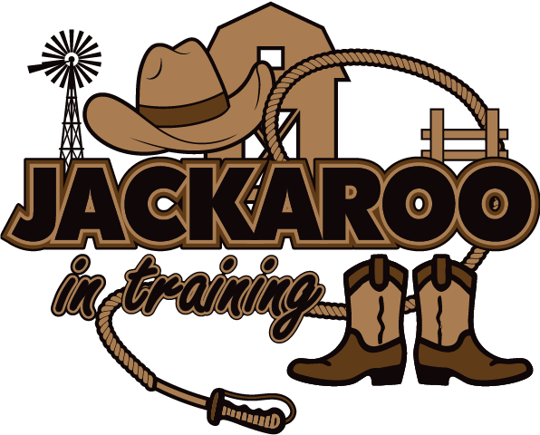 Jackaroo in training design: A brown cowboy hat, a windmill, a lasso rope and a barn behind "JACKAROO" in brown western lettering, with "in training" in script and a pair of cowboy boots.