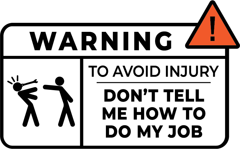 Warning design: A safety-sign style panel with an orange warning triangle and "WARNING" header, stick figures of one worker kicking another, and "TO AVOID INJURY DON'T TELL ME HOW TO DO MY JOB".